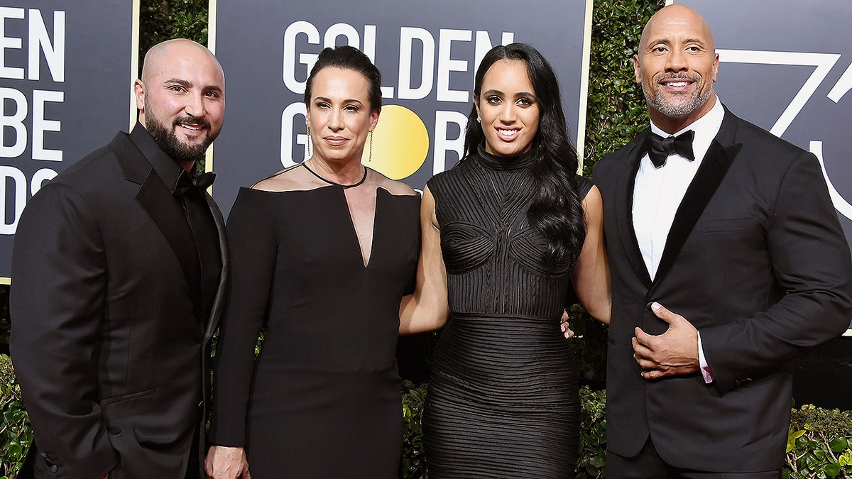 BEVERLY HILLS, CA - JANUARY 07:  (L-R) Dave Rienzi, producer Dany Garcia, Golden Globe Ambassador Simone Garcia Johnson, and actor Dwayne Johnson attend The 75th Annual Golden Globe Awards at The Beverly Hilton Hotel on January 7, 2018 in Beverly Hills, California.  (Photo by Steve Granitz/WireImage)