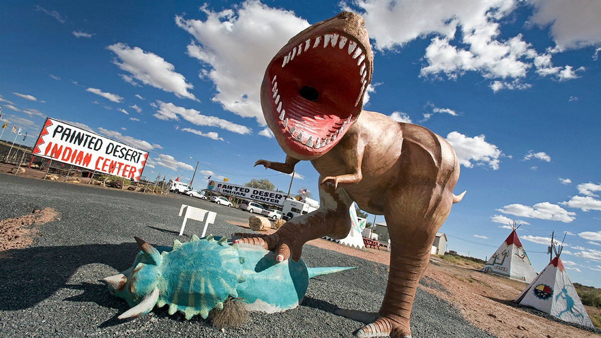 A dinosaur model greets visitors near Arizona's Painted Desert.