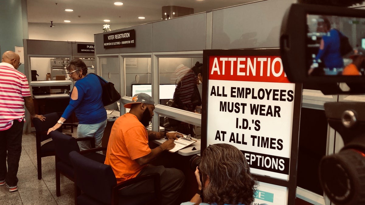Former felons register to vote in Miami on Jan. 8, 2019.