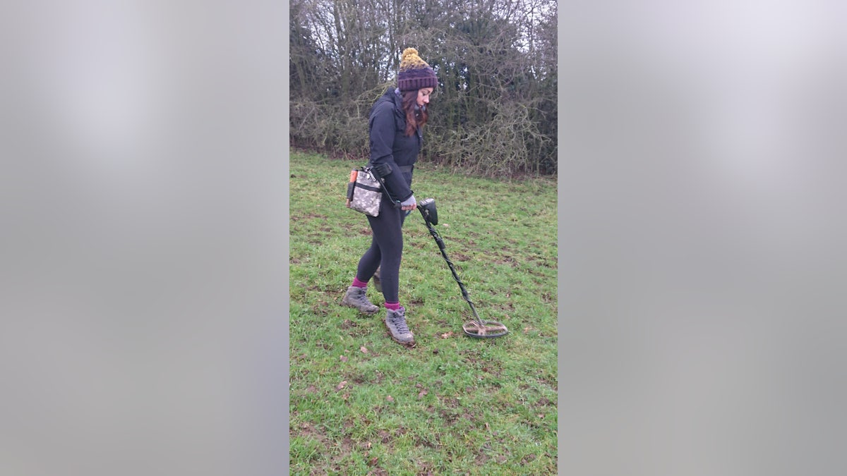 Haseler, 30, is seen using a metal-detector shortly before she found the engagement ring.