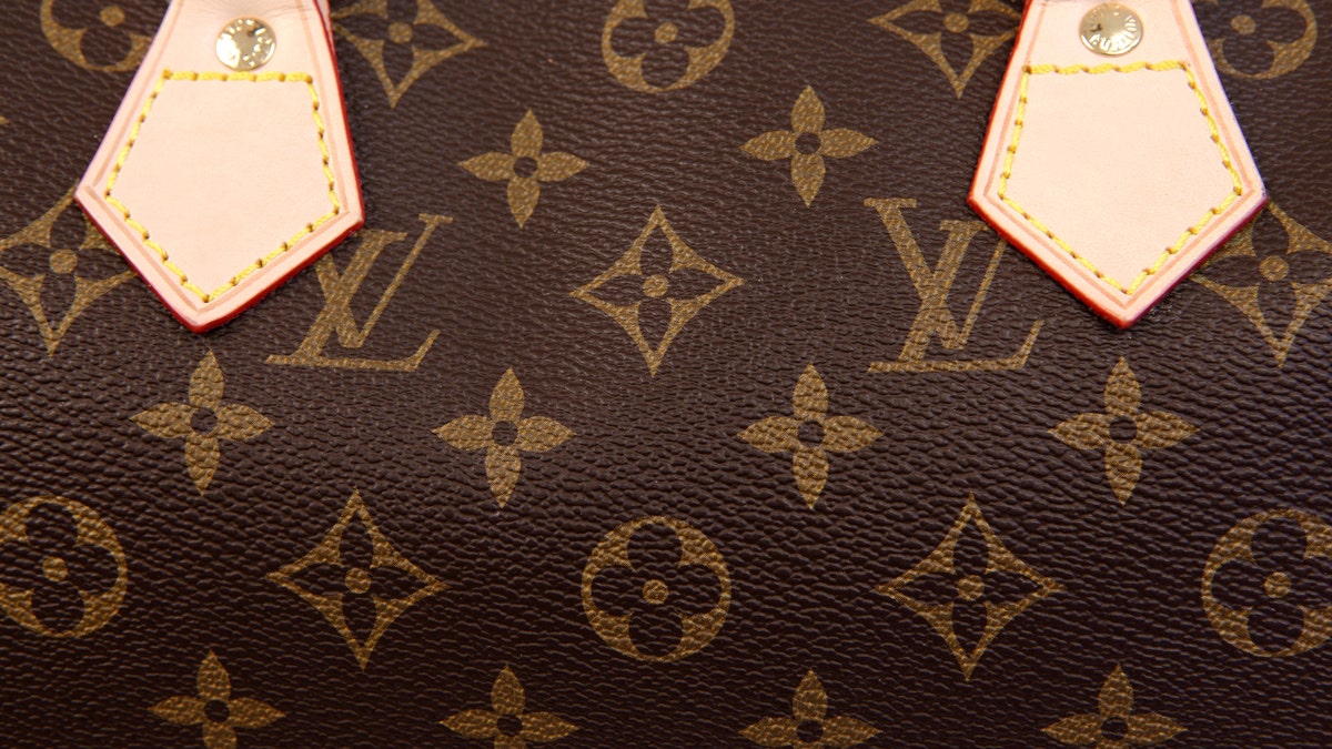 Police: Second man charged after selling fake Louis Vuitton bags