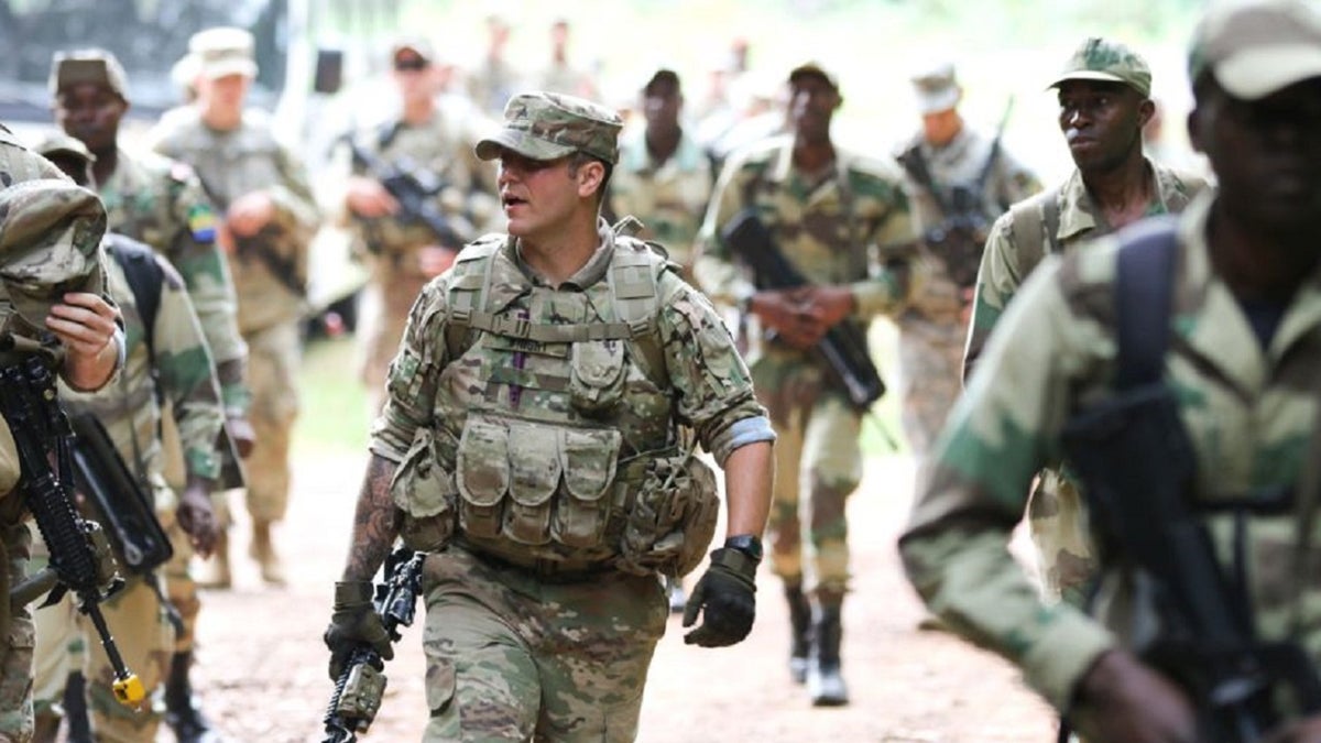 FILE: A team leader with 1st Battalion, 327th Infantry Regiment, 101st Airborne Division and other members of his platoon head out on a terrain walk through a rainforest warfare training center in Libreville, Gabon, July 26, 2017.