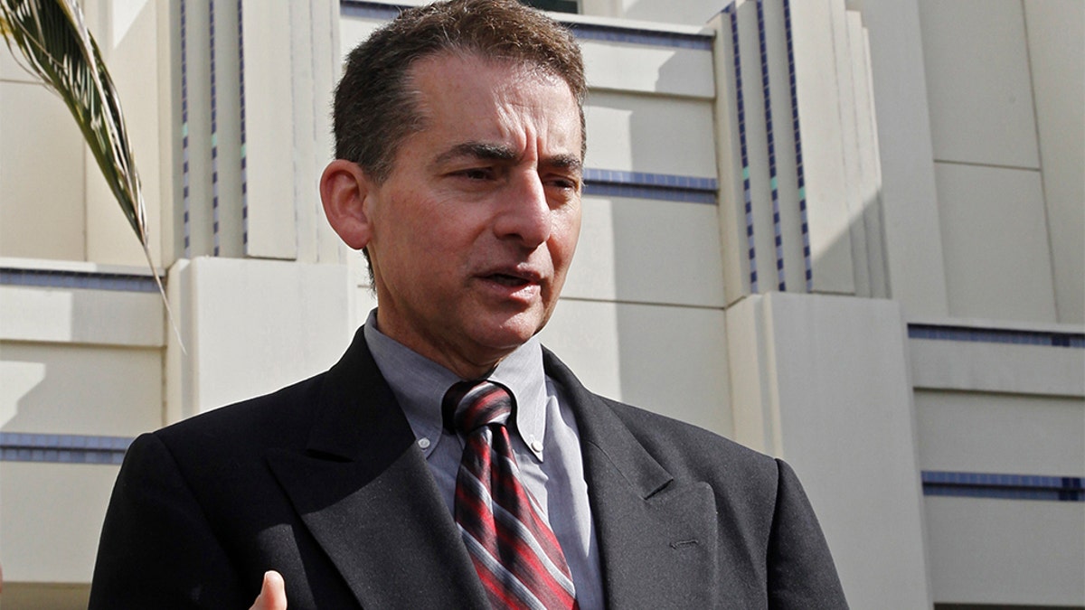 Beverly Hills police Lt. Mark Rosen speaks at a news conference outside the Beverly Hills Hilton Hotel in Beverly Hills, Calif. (AP Photo/Damian Dovarganes, File)