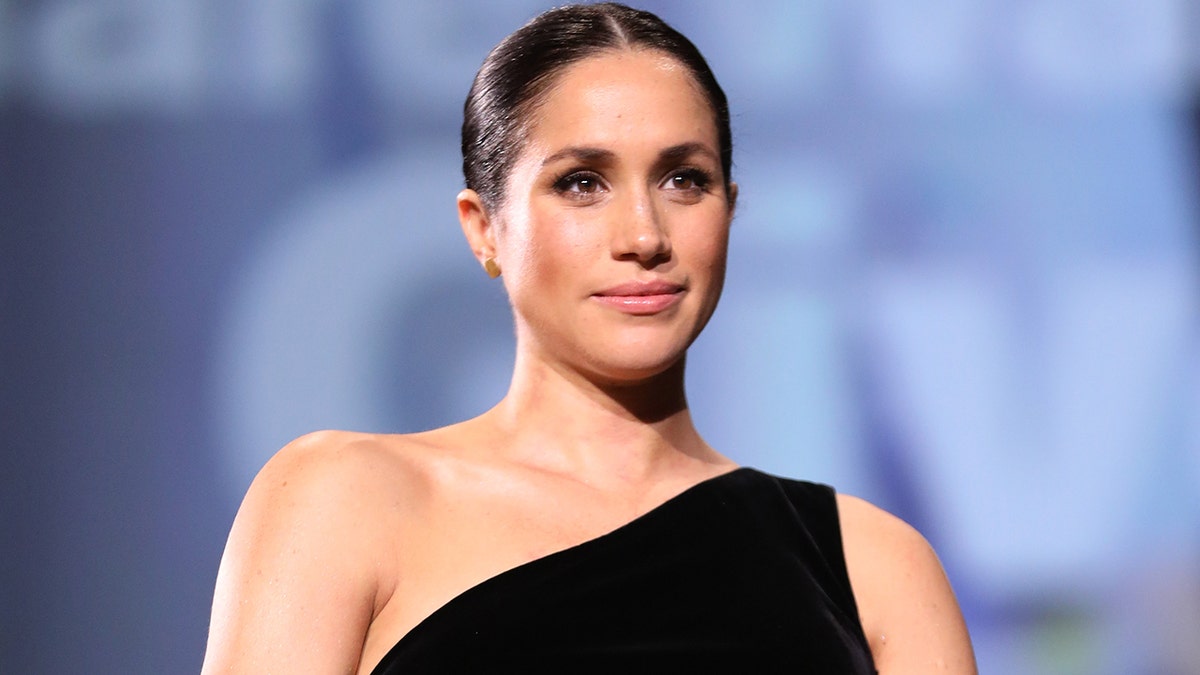 LONDON, ENGLAND - DECEMBER 10: Meghan, Duchess of Sussex on stage during The Fashion Awards 2018 In Partnership With Swarovski at Royal Albert Hall on December 10, 2018 in London, England. (Photo by Tristan Fewings/BFC/Getty Images)