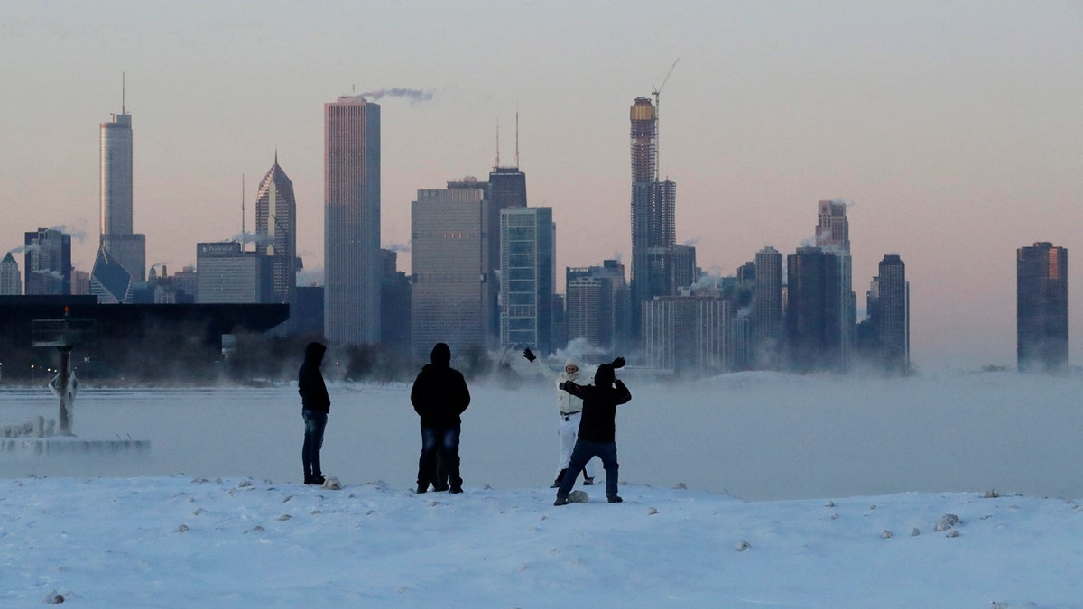 A deadly arctic deep freeze enveloped the Midwest with record-breaking temperatures on Wednesday, triggering widespread closures of schools and businesses, and prompting the U.S.