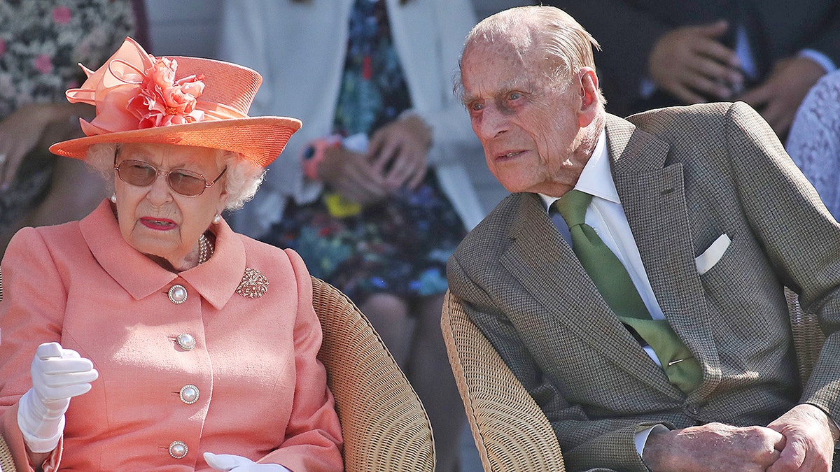 Queen Elizabeth II and The Duke of Edinburgh during the polo at the Guards Polo Club, Windsor Great Park, Egham, Surrey. (Photo by Steve Parsons/PA Images via Getty Images)