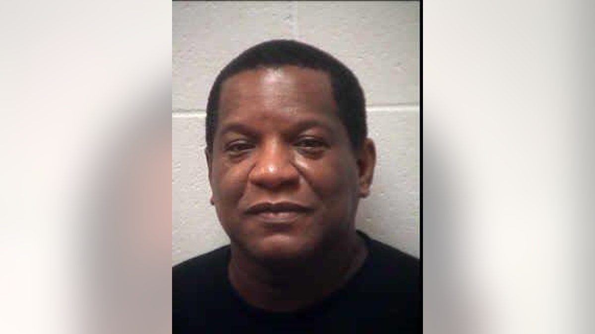 R. Kelly's former manager Henry James Mason has been charged with making terroristic threats.