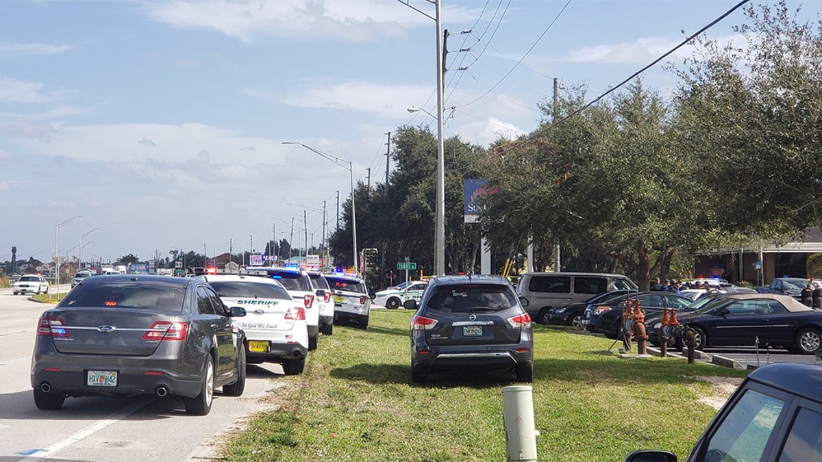 Motive unknown in Florida bank shooting, gunman no connection to ...