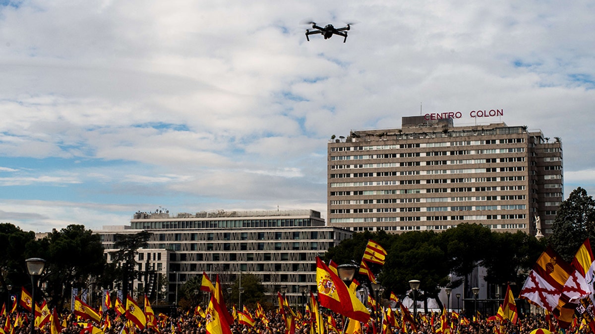 Spanish authorities have revealed they arrested 12 people in connection to a drug smuggling ring that was using drones to spy on police