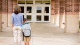 Mom taking son to school