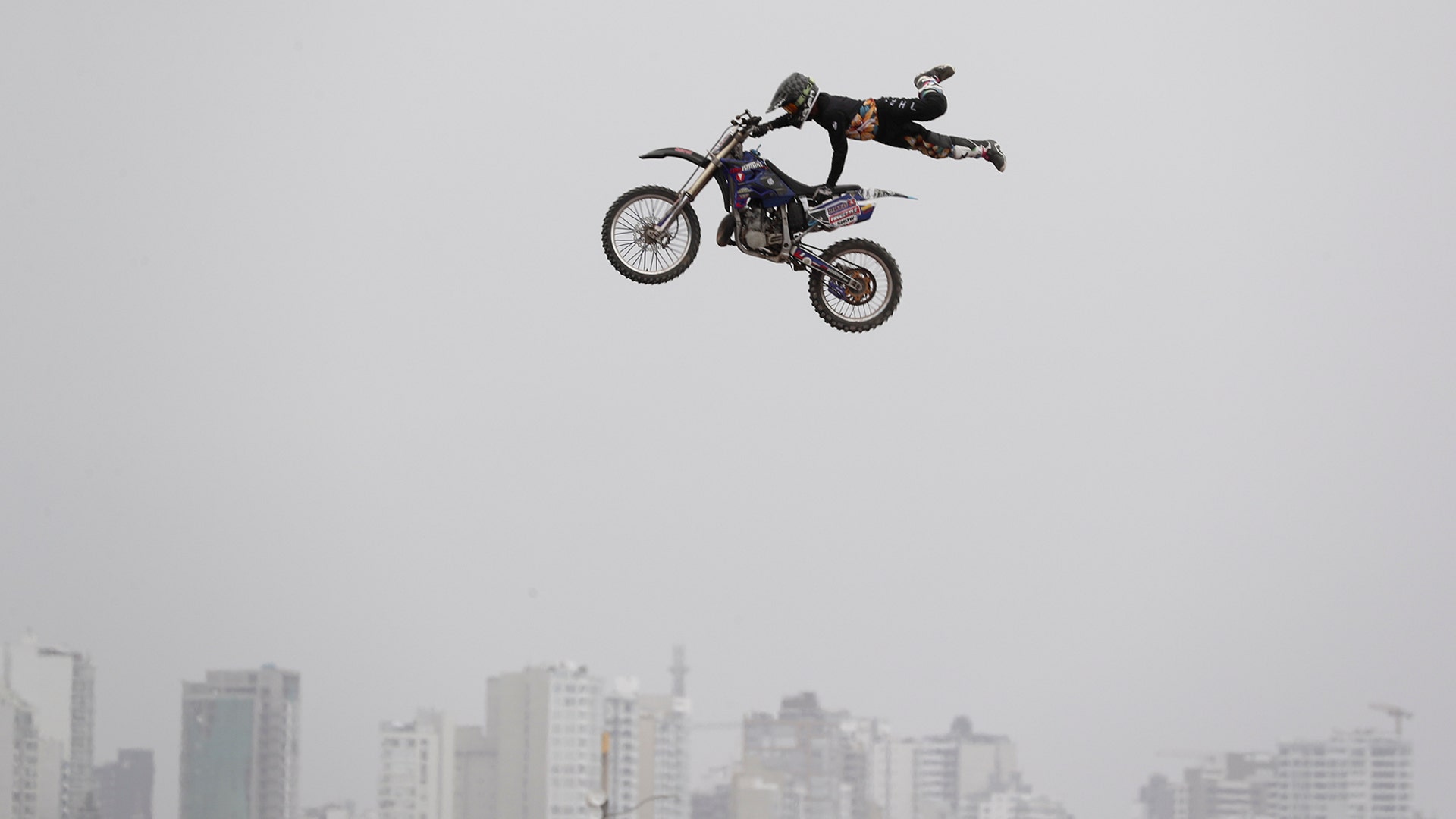 A rider performs prior to the opening ceremony for the Dakar Rally in Lima, Peru, Jan. 6, 2019.