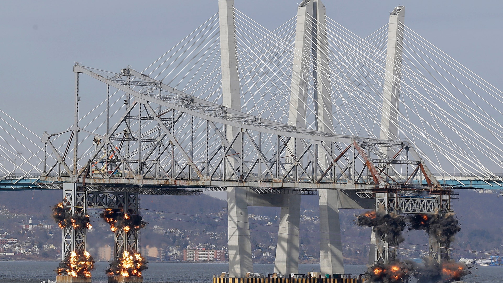 A section of the old Tappan Zee Bridge is brought down with explosives in this view from Tarrytown, N.Y., Jan. 15, 2019. 