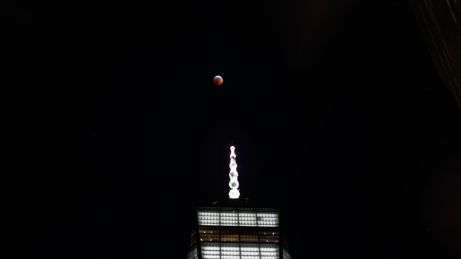 Photographers in New York City braved sub-zero temperatures to capture images of the super blood Moon.