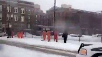 Viral photo of Chicago inmates shoveling in freezing weather sparks outrage as jail offers explanation