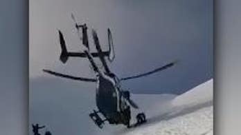 Helicopter rescues injured skier in French Alps, dramatic video shows