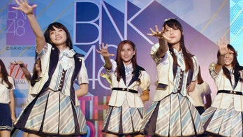 Thai girl band singer apologizes for swastika shirt