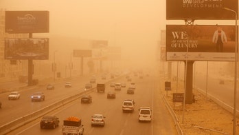 Amazing pictures show huge sandstorm turn Cairo orange