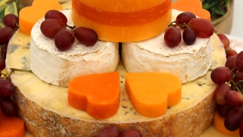 Bride broke down 'in tears' after guests dig into non-traditional cake before she could cut it, guest claims