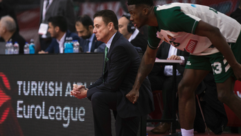 Olympiakos beats Panathinaikos 79-65, first loss for Pitino