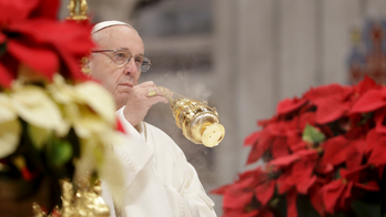 The Latest: Pope urges aid to poor, homeless on Epiphany