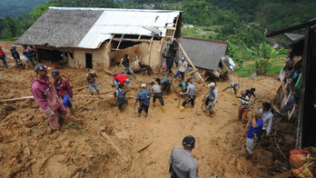 Rain sets off Indonesia landslide, killing 9 with 34 missing