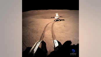 Chinese rover powers up devices in pioneering moon mission
