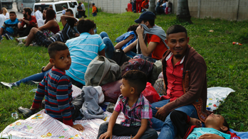 As new U.S.-bound caravan grows to more than 2,000, Mexicans lash out