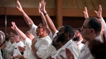 Rival gang members risk their lives to get baptized together in Texas maximum-security prison