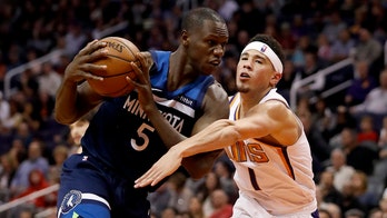 Phoenix Suns' Devin Booker seen rushing to tunnel to meet Timberwolves' Gorgui Dieng after ejections