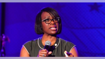 Dem congressional candidate rails against corruption but her political director is under investigation