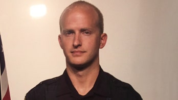 Utah police officer shot, killed while attempting to arrest fugitive, officials say
