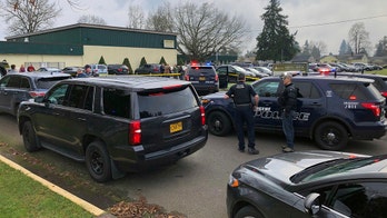 Custody dispute leaves one person dead at Oregon school, police say