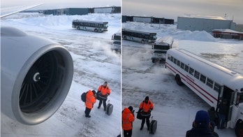 United Airlines passengers stranded on plane for over 14 hours at freezing airport in Canada