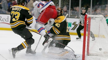 Boston Bruins goalie Tuukka Rask leaves NHL game with concussion after hard collision