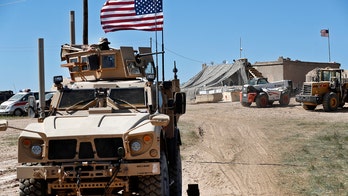 US troops begin to withdraw from Syria, official says