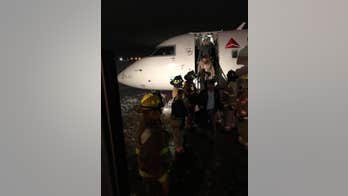 SkyWest flight slides off taxiway at Indiana airport amid icy conditions