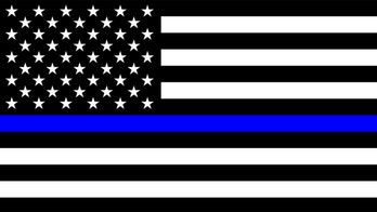 Controversy over Blue Lives Matter flag forces family of fallen officer to remove it from utility pole