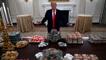 Trump serves burgers, fries and pizza to college football champions Clemson