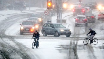 Kansas snow plow driver dies after salt truck rolls on top of him