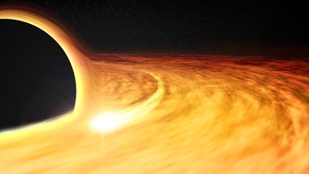 This huge black hole is spinning at half the speed of light