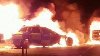 Police car mysteriously bursts into flames during emergency call