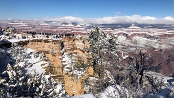 Rare winter storm brings snow to Arizona desert, as Midwest, Northeast avoid deep cold