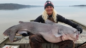 Woman catches 'monster' 88-pound catfish on Kentucky Lake, says it's a 'personal best'