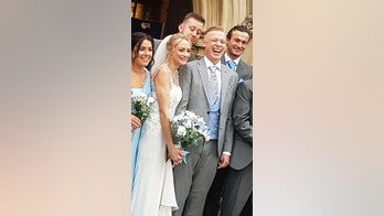 Groomsman caught checking out friend's new bride in 'cheeky' wedding photo