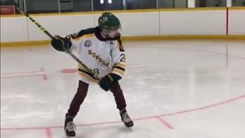 Canadian hockey team bus crash survivor returns to the rink