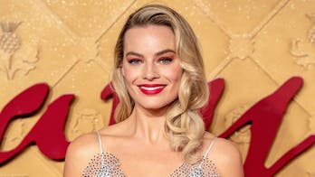 Margot Robbie looks unrecognizable as she rocks racy outfit for filming of 'Babylon'