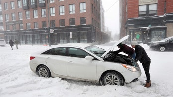 Bitter cold sets in as winter storm in Northeast wreaks havoc on travel
