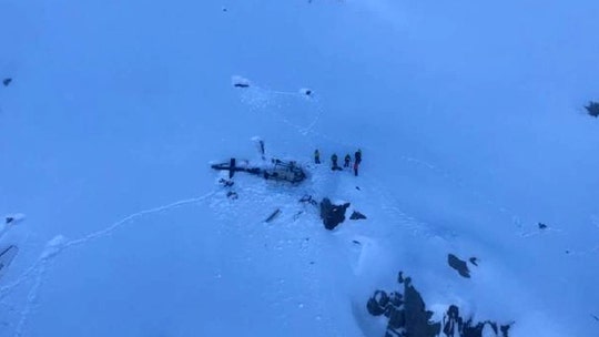 Tourist plane and helicopter crash above glacier in Italian Alps, killing at least five