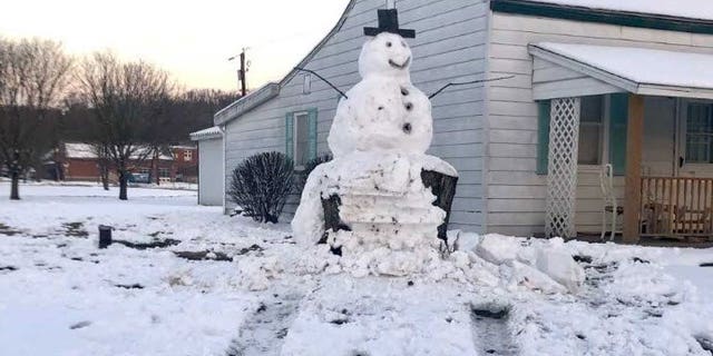   A Kentucky driver was about to wake up brutally when he was apparently attempting to flip a snowman - only to hit the tree stump beneath it. 