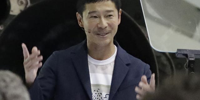 Japanese billionaire Yusaku Maezawa speaks after SpaceX founder and chief executive Elon Musk announced him as the person who would be the first private passenger on a trip around the moon, Monday, Sept. 17, 2018, in Hawthorne, Calif.